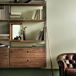 String schnapps cabinet, Walnut, inside of door stainless steel plate, mirrored glass back piece