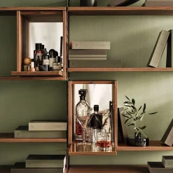 String schnapps cabinet, Walnut, inside of door stainless steel plate, mirrored glass back piece