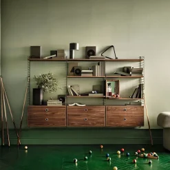 String schnapps cabinet, Walnut, inside of door stainless steel plate, mirrored glass back piece